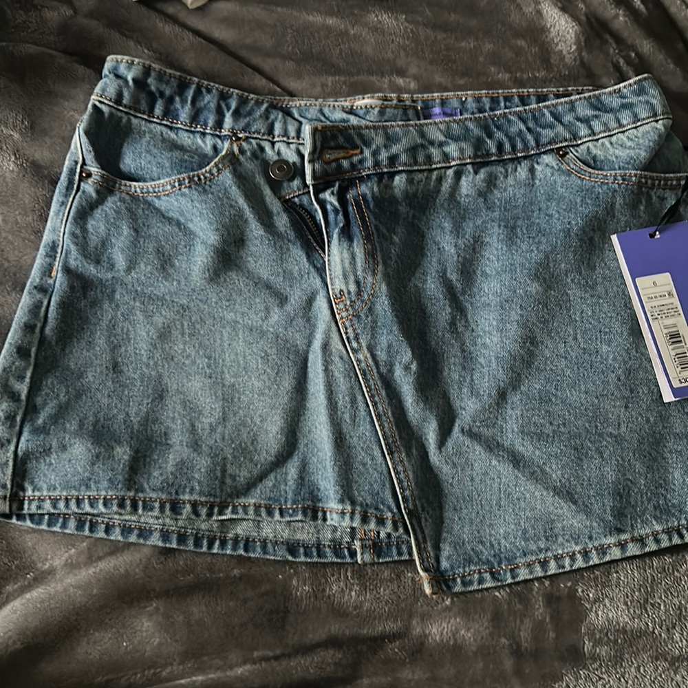 Asymmetrical denim skirt from the future collection